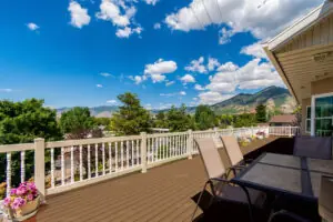 An elegant deck railing with brown deck