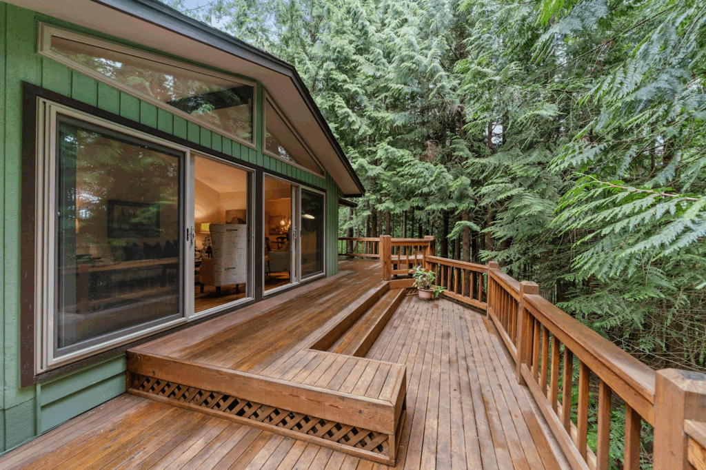 brown-wooden-terrace-outside-clear-glass-door
