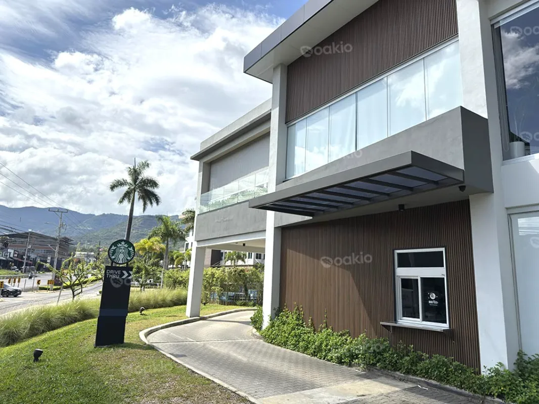a full view at the drive-thru area with Oakio WPC Cladding