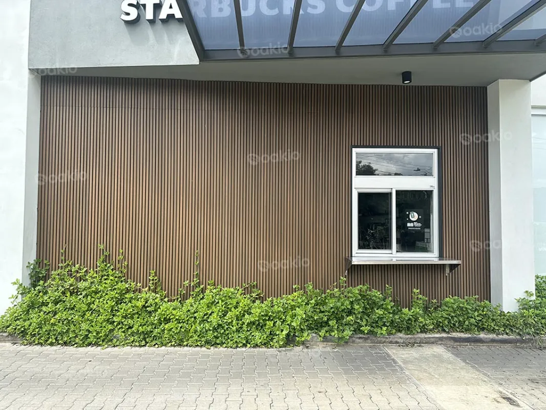 a closer look at the drive-thru area with Oakio WPC Cladding