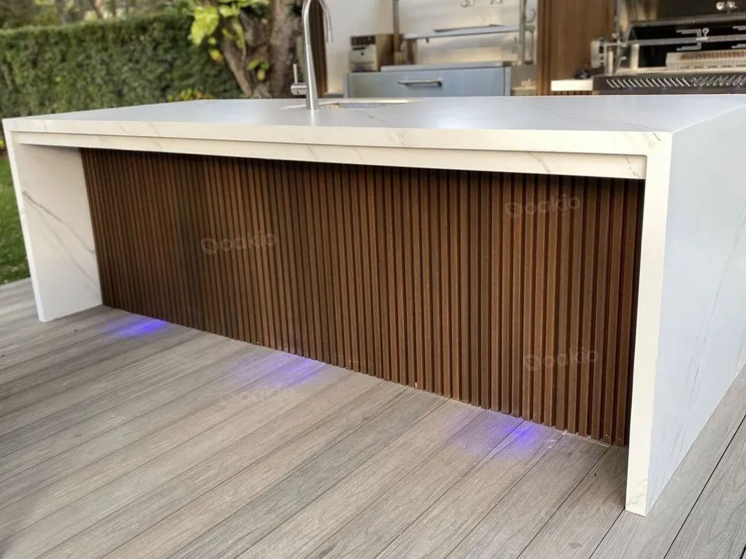 modern outdoor kitchen island with wpc panel accents