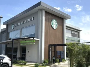 full view of a starbucks cafe facade with oakio wpc cladding