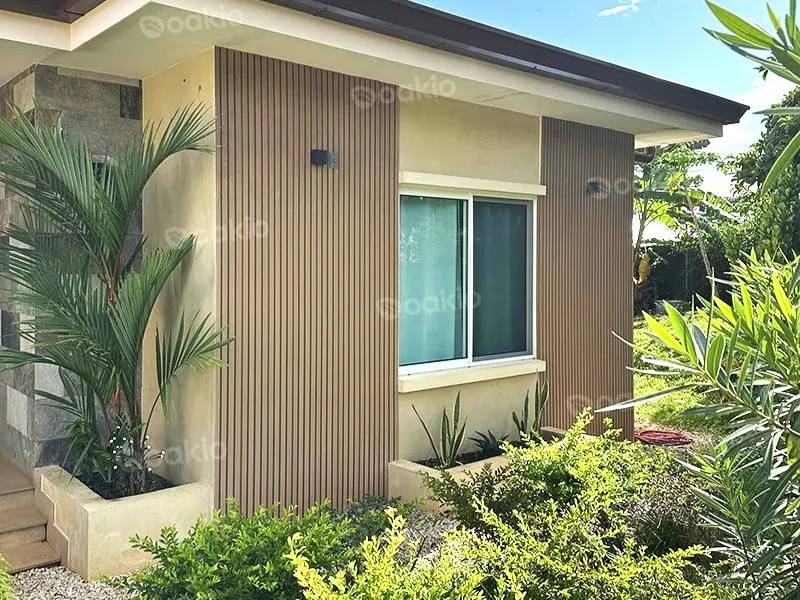 modern villa exterior with oakio wpc wall cladding